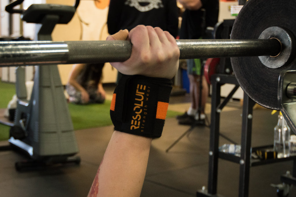 18" Wrist Wraps Black/Orange - Resolute Strength Wear