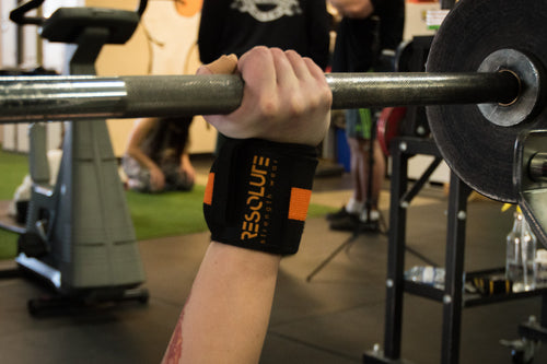 18" Wrist Wraps Black/Orange - Resolute Strength Wear